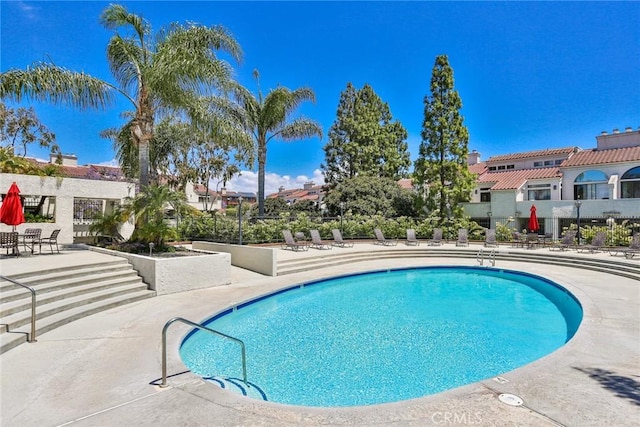 17202 Corbina Ln Unit 208, Huntington Beach, CA 92649 - community pool featuring a patio area and a residential view