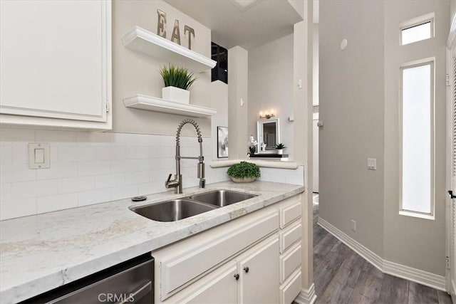 17202 Corbina Ln Unit 208, Huntington Beach, CA 92649 - kitchen featuring open shelves, stainless steel dishwasher, white cabinets, decorative backsplash, and dark wood finished floors