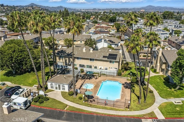 1465 E Lexington Ave Unit 4C, El Cajon, CA 92019 - aerial view of residential area featuring a pool and a mountain backdrop