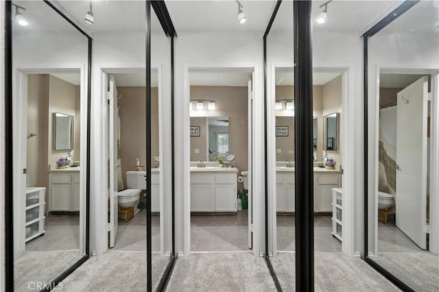 1465 E Lexington Ave Unit 4C, El Cajon, CA 92019 - bathroom with vanity and tile patterned flooring