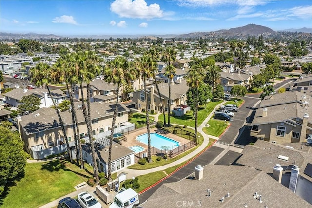 1465 E Lexington Ave Unit 4C, El Cajon, CA 92019 - aerial perspective of suburban area featuring a pool area and a mountainous background