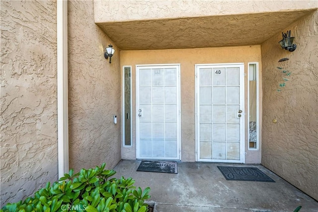 1465 E Lexington Ave Unit 4C, El Cajon, CA 92019 - property entrance featuring stucco siding