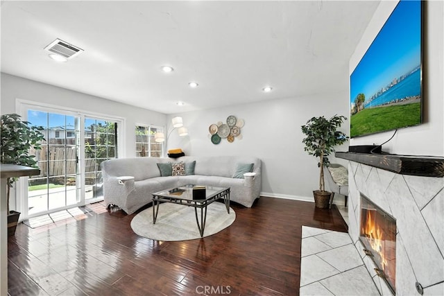 1465 E Lexington Ave Unit 4C, El Cajon, CA 92019 - living room with wood finished floors, recessed lighting, and a high end fireplace