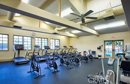 2205 Via Mariposa E Unit A, Laguna Woods, CA 92637 - gym featuring plenty of natural light, ceiling fan, and french doors