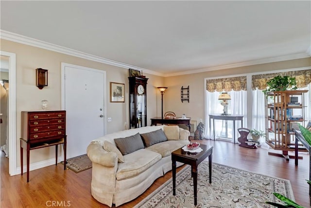 2205 Via Mariposa E Unit A, Laguna Woods, CA 92637 - living room with wood finished floors and ornamental molding