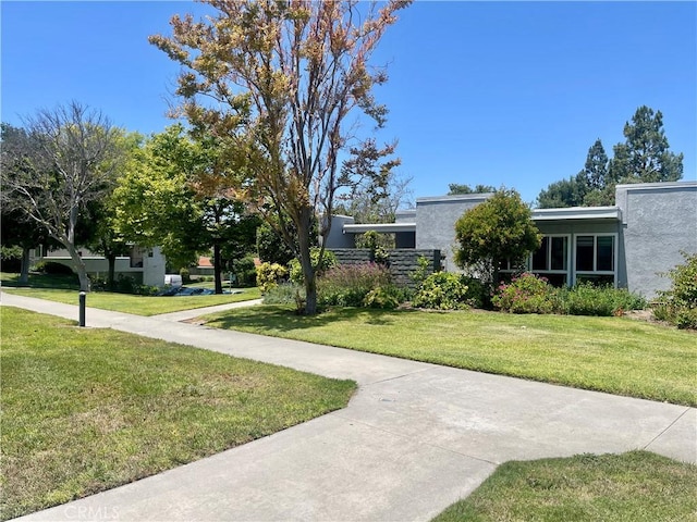 2205 Via Mariposa E Unit A, Laguna Woods, CA 92637 - view of grassy yard