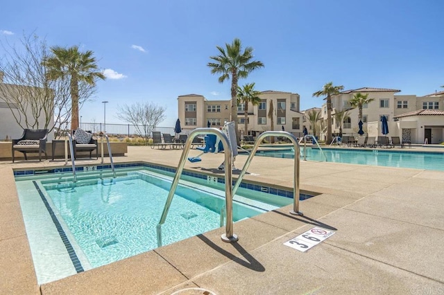 5140 Calle Sand Arch Unit 61, San Diego, CA 92154 - community pool featuring a patio area