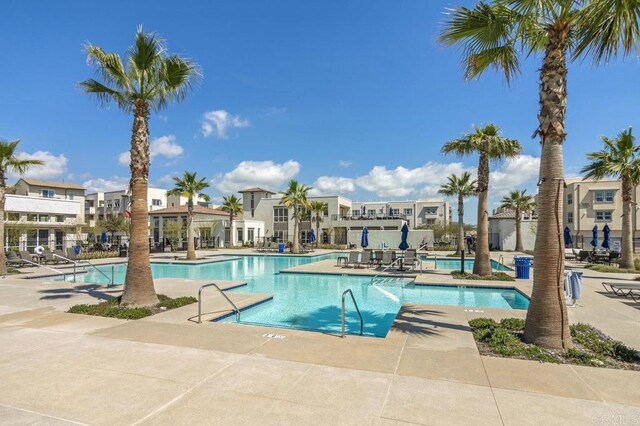 5140 Calle Sand Arch Unit 61, San Diego, CA 92154 - community pool featuring a patio and a residential view