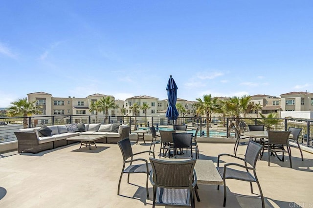 5140 Calle Sand Arch Unit 61, San Diego, CA 92154 - view of patio featuring outdoor lounge area and a residential view