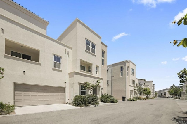 5140 Calle Sand Arch Unit 61, San Diego, CA 92154 - view of property featuring an attached garage