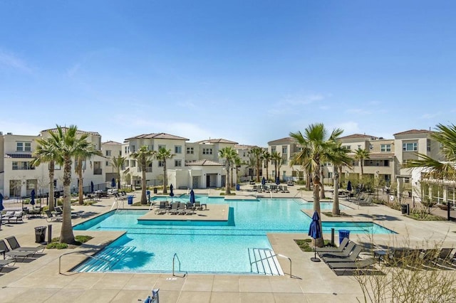 5140 Calle Sand Arch Unit 61, San Diego, CA 92154 - community pool featuring a residential view and a patio area