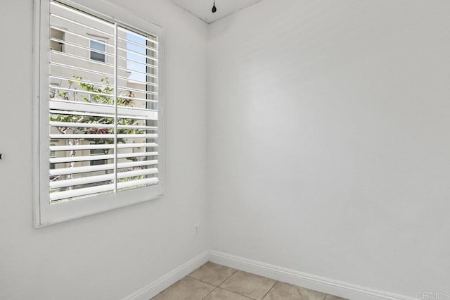 5140 Calle Sand Arch Unit 61, San Diego, CA 92154 - empty room with baseboards and light tile patterned floors
