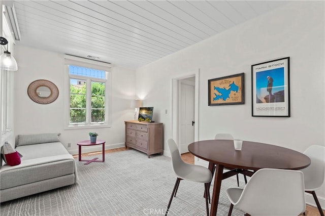 28233 N Shore Rd, Lake Arrowhead, CA 92352 - dining room with baseboards and wood ceiling