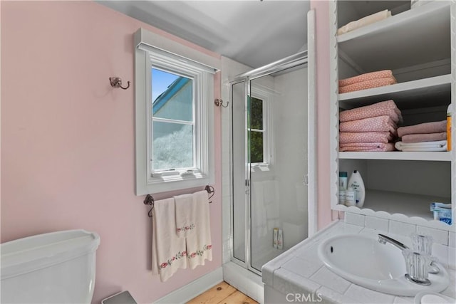 28233 N Shore Rd, Lake Arrowhead, CA 92352 - bathroom with a stall shower and wood finished floors