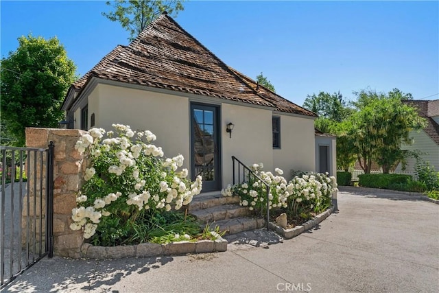 28233 N Shore Rd, Lake Arrowhead, CA 92352 - view of front of property with stucco siding