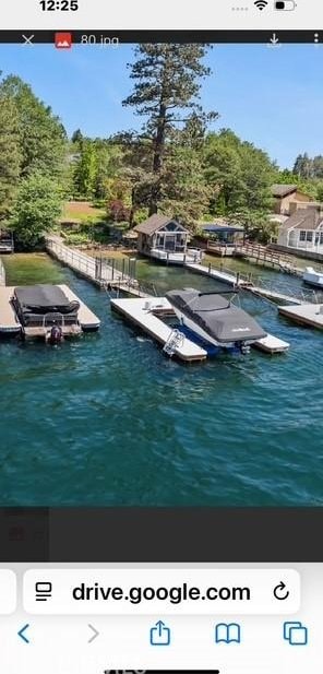 28233 N Shore Rd, Lake Arrowhead, CA 92352 - view of pool featuring a water view and a boat dock