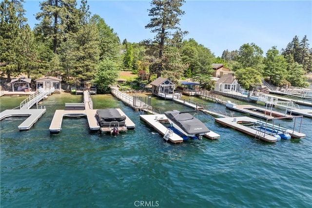 28233 N Shore Rd, Lake Arrowhead, CA 92352 - dock area featuring view of wooded area and a water view