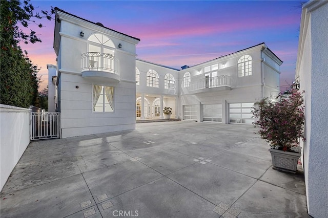 759 Foxkirk Rd, Glendale, CA 91206 - view of front of house featuring a balcony, a garage, and concrete driveway