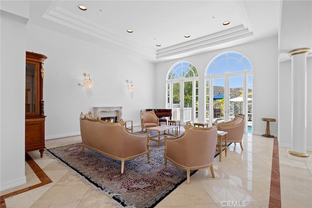 759 Foxkirk Rd, Glendale, CA 91206 - living area featuring a raised ceiling, decorative columns, inlaid floor details, and recessed lighting