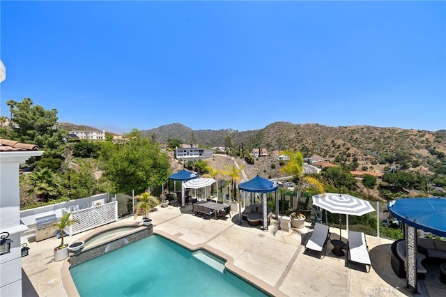 759 Foxkirk Rd, Glendale, CA 91206 - swimming pool with a mountain view, a patio, and an in-ground hot tub