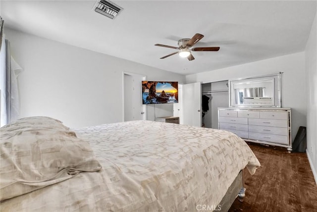 5005 Pearblossom Dr, Riverside, CA 92507 - bedroom with dark wood-style flooring, a closet, and ceiling fan