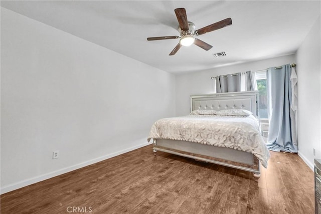 5005 Pearblossom Dr, Riverside, CA 92507 - bedroom featuring wood finished floors and a ceiling fan