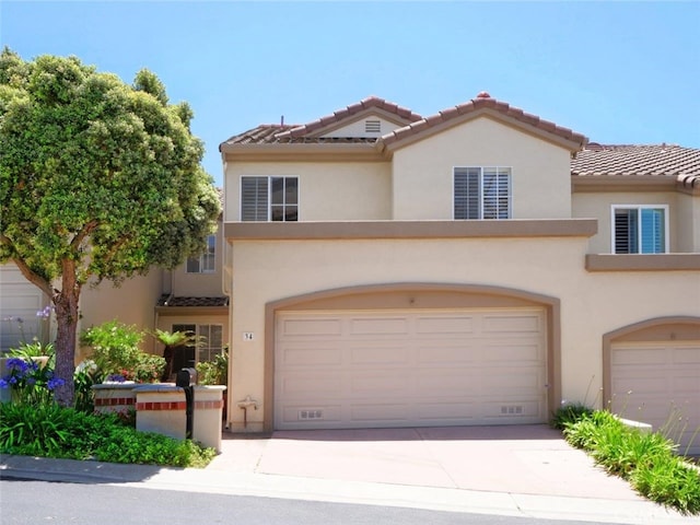 34 Via Capri, Rancho Palos Verdes, CA 90275 - view of front of house featuring stucco siding, a tiled roof, a garage, and driveway