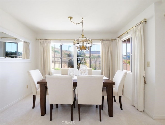 34 Via Capri, Rancho Palos Verdes, CA 90275 - dining space with plenty of natural light, a chandelier, and light colored carpet
