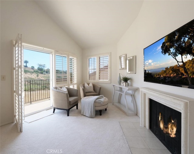 34 Via Capri, Rancho Palos Verdes, CA 90275 - sitting room featuring light carpet, high vaulted ceiling, and a fireplace with flush hearth
