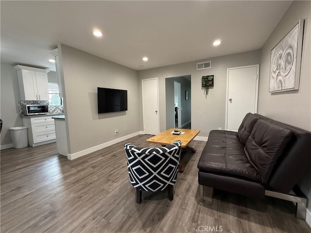 3935 W Mcfadden Ave Unit D, Santa Ana, CA 92704 - living area with wood finished floors and recessed lighting