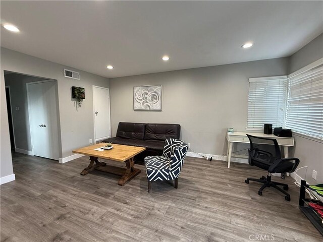 3935 W Mcfadden Ave Unit D, Santa Ana, CA 92704 - living area with wood finished floors, recessed lighting, and an office area