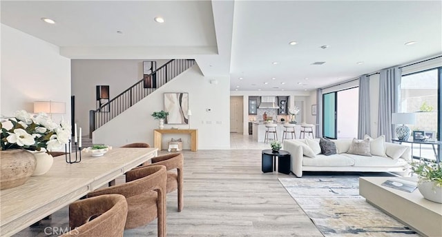 80 Interstellar, Irvine, CA 92618 - living room with light wood-type flooring, recessed lighting, and stairs