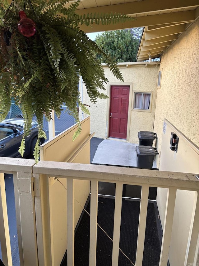129 Brass Ln, Vista, CA 92083 - doorway to property with stucco siding