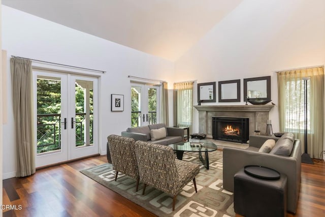 1040 Hillcroft Rd, Glendale, CA 91207 - living room with french doors, a lit fireplace, high vaulted ceiling, and wood finished floors