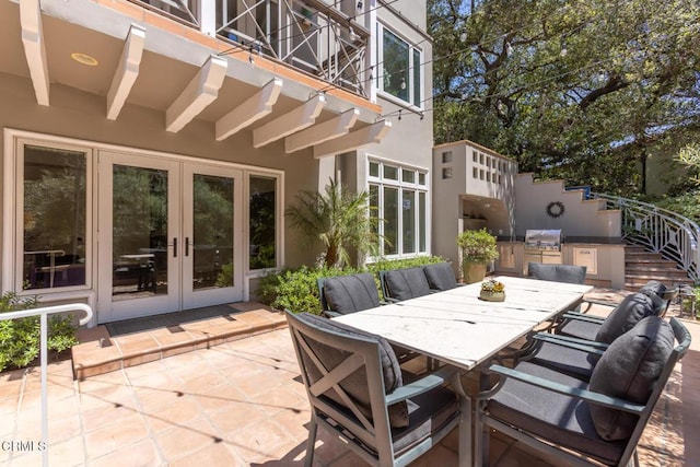 1040 Hillcroft Rd, Glendale, CA 91207 - patio / terrace with french doors, a patio, outdoor dining area, and area for grilling