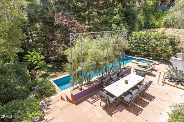 1040 Hillcroft Rd, Glendale, CA 91207 - view of swimming pool featuring outdoor dining space, a patio, and a pool with connected hot tub