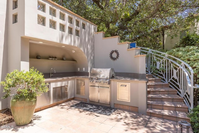 1040 Hillcroft Rd, Glendale, CA 91207 - view of patio with an outdoor kitchen and stairs
