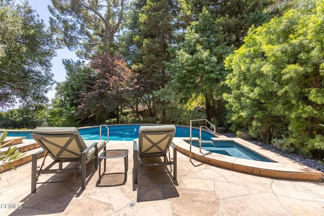 1040 Hillcroft Rd, Glendale, CA 91207 - view of pool with view of scattered trees, a patio area, and a pool with connected hot tub