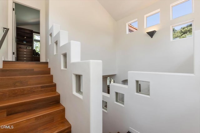 1040 Hillcroft Rd, Glendale, CA 91207 - staircase featuring healthy amount of natural light and lofted ceiling