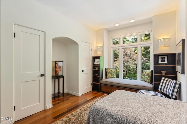 1040 Hillcroft Rd, Glendale, CA 91207 - bedroom featuring arched walkways, wood finished floors, and recessed lighting