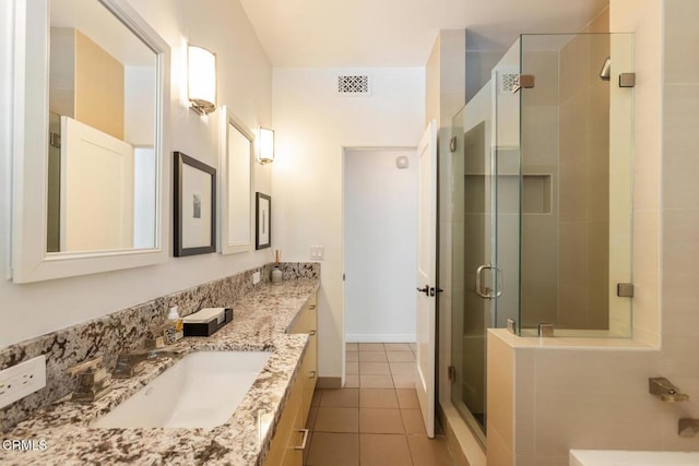 1040 Hillcroft Rd, Glendale, CA 91207 - full bath with double vanity, a stall shower, and tile patterned floors