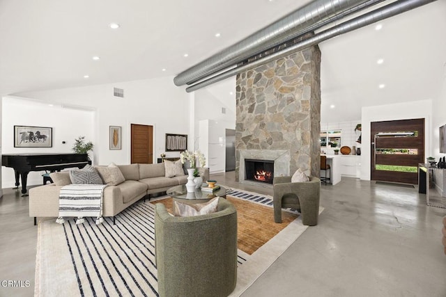 1305 Riviera Dr, Pasadena, CA 91107 - living room with concrete flooring, a stone fireplace, high vaulted ceiling, and recessed lighting
