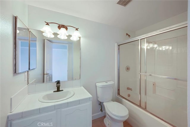 1211 E Carson St Unit 27, Carson, CA 90745 - bathroom featuring vanity and combined bath / shower with glass door