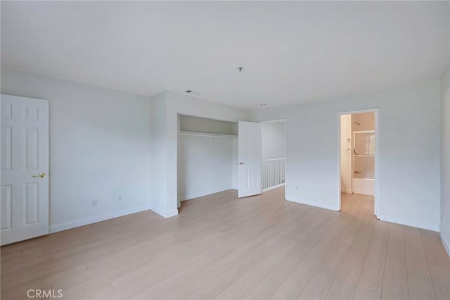 1211 E Carson St Unit 27, Carson, CA 90745 - empty room with light wood-style floors and a pendent fire sprinkler