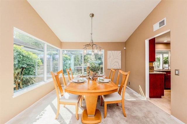 2771 Wyckersham Pl, Fullerton, CA 92833 - dining room featuring a chandelier, lofted ceiling, and light colored carpet