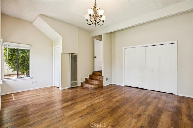 1263 Pismo St, San Luis Obispo, CA 93401 - unfurnished living room with a chandelier, a heating unit, and wood-type flooring