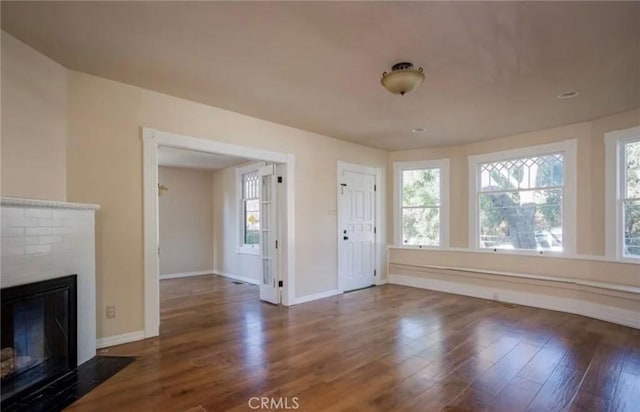 1263 Pismo St, San Luis Obispo, CA 93401 - unfurnished living room with a fireplace and wood finished floors