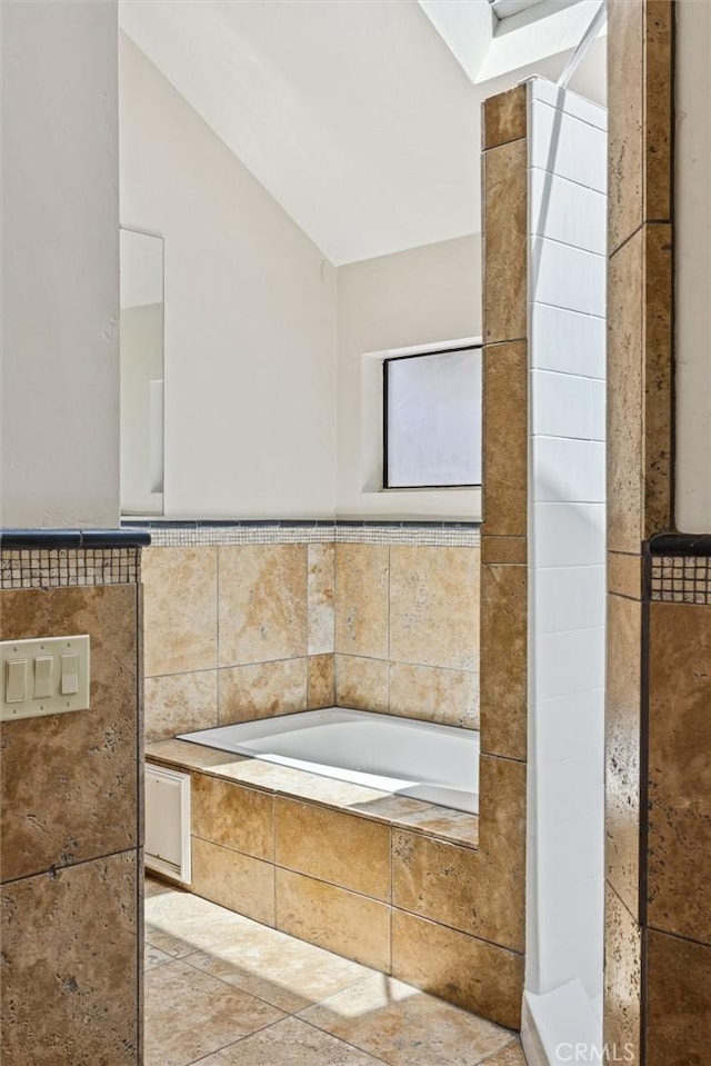 1263 Pismo St, San Luis Obispo, CA 93401 - bathroom featuring a bath and lofted ceiling