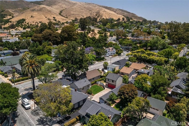 1263 Pismo St, San Luis Obispo, CA 93401 - aerial view of property and surrounding area featuring nearby suburban area and a mountainous background