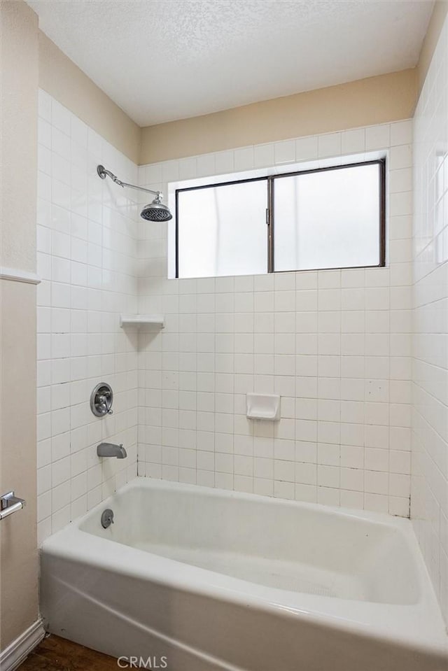 1263 Pismo St, San Luis Obispo, CA 93401 - full bathroom with washtub / shower combination and a textured ceiling